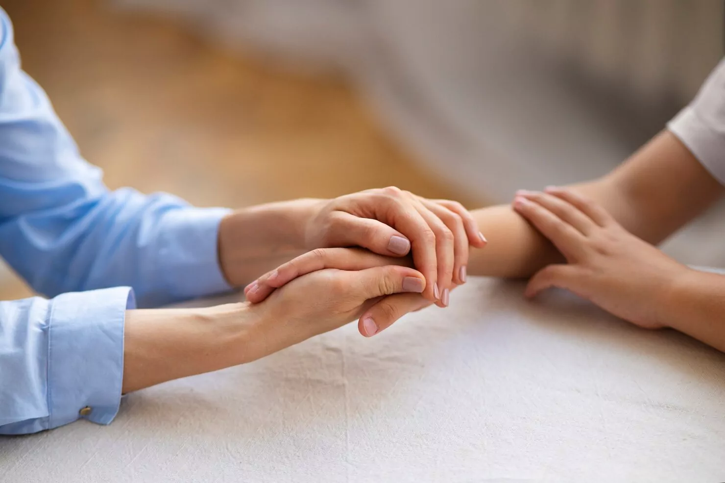 Caregiver helping a senior woman at home