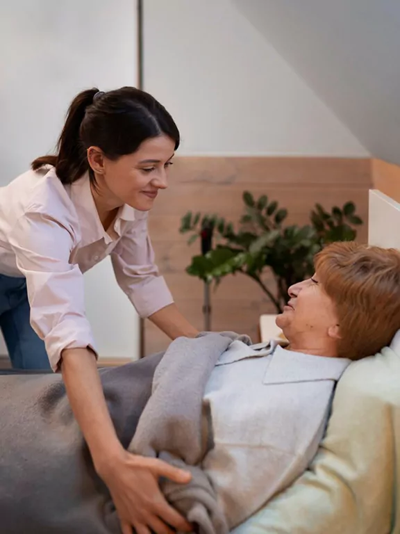 Companion caregiver spending time with a senior